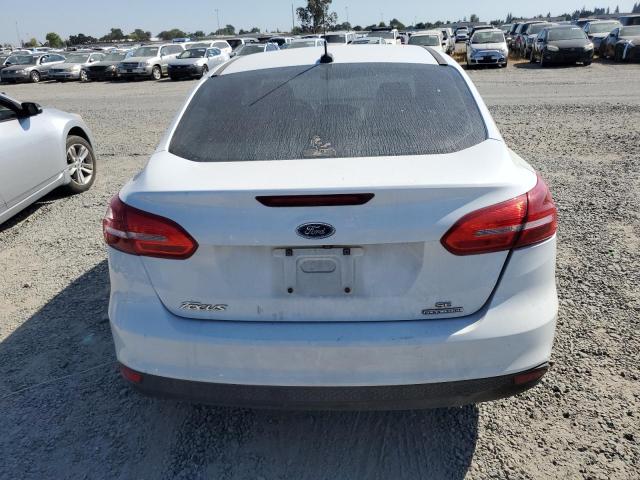 Photo 5 VIN: 1FADP3F25GL205870 - FORD FOCUS 