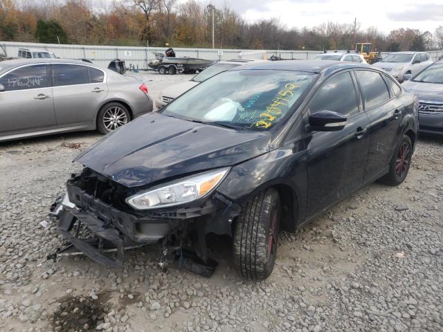 Photo 1 VIN: 1FADP3F25GL216870 - FORD FOCUS SE 