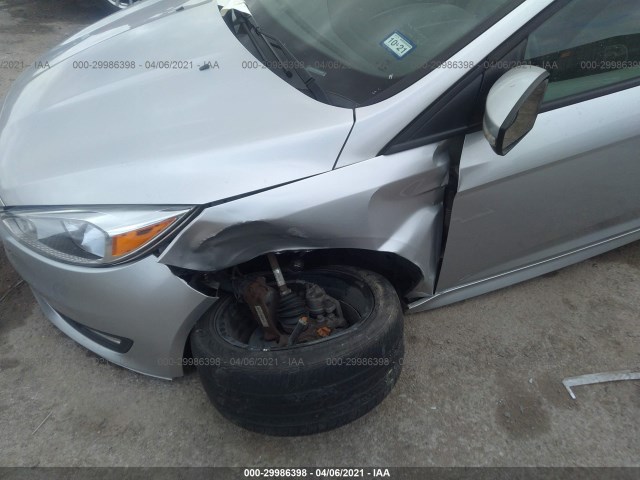 Photo 5 VIN: 1FADP3F25GL225696 - FORD FOCUS 