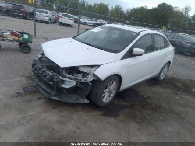 Photo 1 VIN: 1FADP3F25GL228324 - FORD FOCUS 