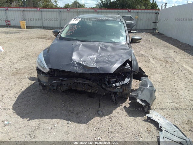 Photo 5 VIN: 1FADP3F25GL228646 - FORD FOCUS 