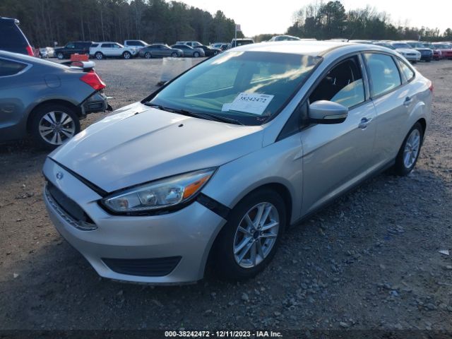 Photo 1 VIN: 1FADP3F25GL230879 - FORD FOCUS 