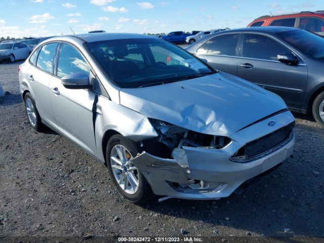 Photo 5 VIN: 1FADP3F25GL230879 - FORD FOCUS 