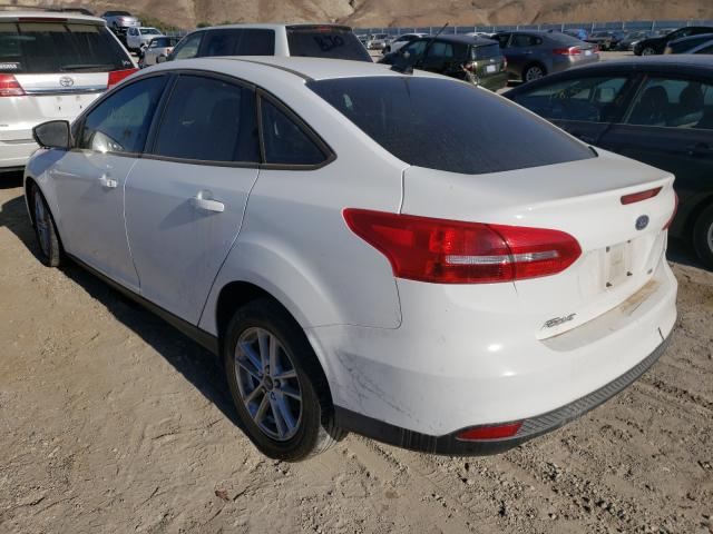 Photo 2 VIN: 1FADP3F25GL235242 - FORD FOCUS SE 