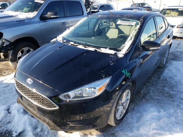 Photo 1 VIN: 1FADP3F25GL243244 - FORD FOCUS SE 