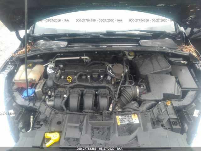 Photo 9 VIN: 1FADP3F25GL251425 - FORD FOCUS 