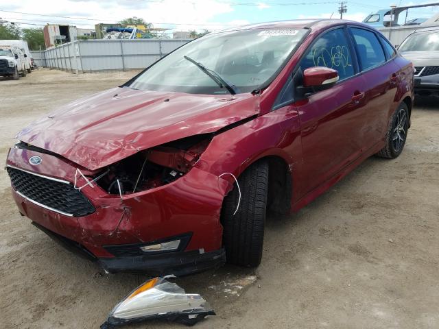 Photo 1 VIN: 1FADP3F25GL258679 - FORD FOCUS SE 