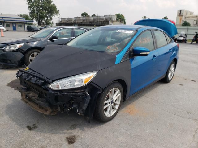 Photo 1 VIN: 1FADP3F25GL281606 - FORD FOCUS SE 