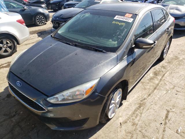 Photo 1 VIN: 1FADP3F25GL281878 - FORD FOCUS SE 