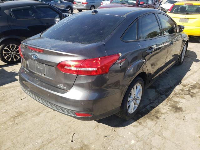 Photo 3 VIN: 1FADP3F25GL281878 - FORD FOCUS SE 