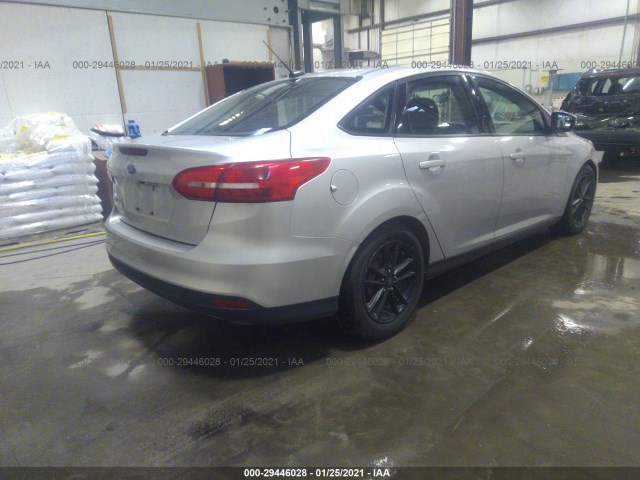 Photo 3 VIN: 1FADP3F25GL284683 - FORD FOCUS 