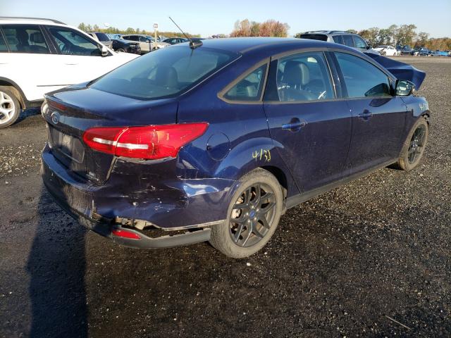 Photo 3 VIN: 1FADP3F25GL288135 - FORD FOCUS 