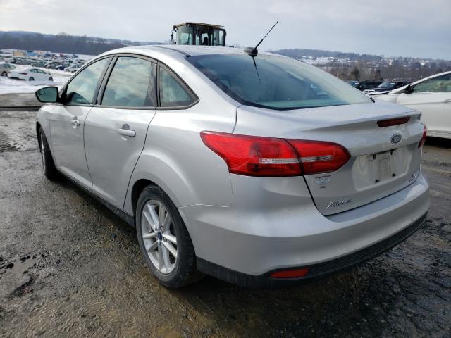 Photo 2 VIN: 1FADP3F25GL290256 - FORD FOCUS SE 