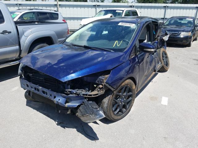 Photo 1 VIN: 1FADP3F25GL290693 - FORD FOCUS SE 