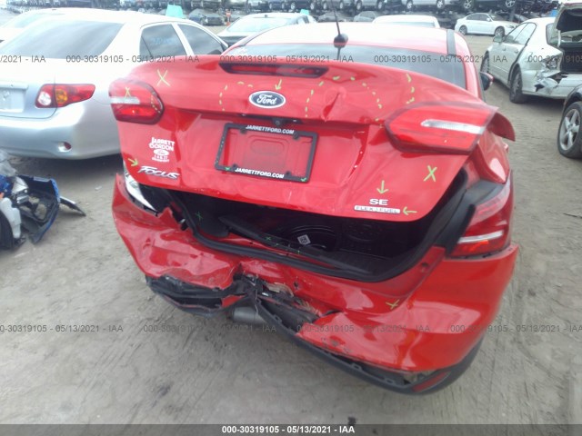 Photo 5 VIN: 1FADP3F25GL292671 - FORD FOCUS 