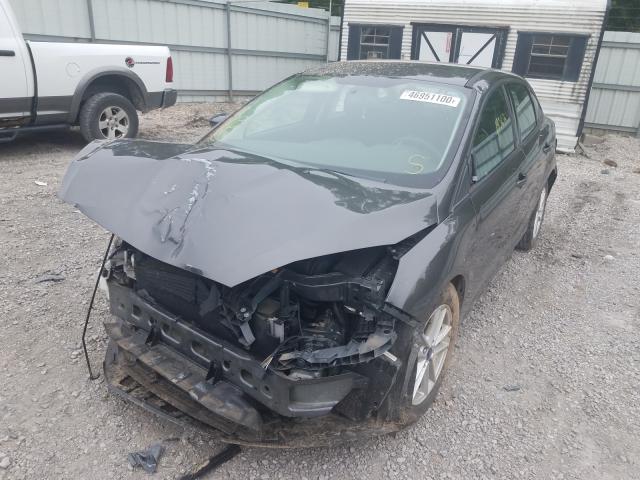 Photo 1 VIN: 1FADP3F25GL297028 - FORD FOCUS SE 