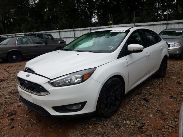 Photo 1 VIN: 1FADP3F25GL299698 - FORD FOCUS 