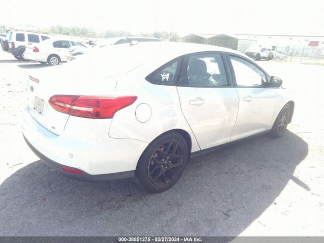 Photo 3 VIN: 1FADP3F25GL299717 - FORD FOCUS 