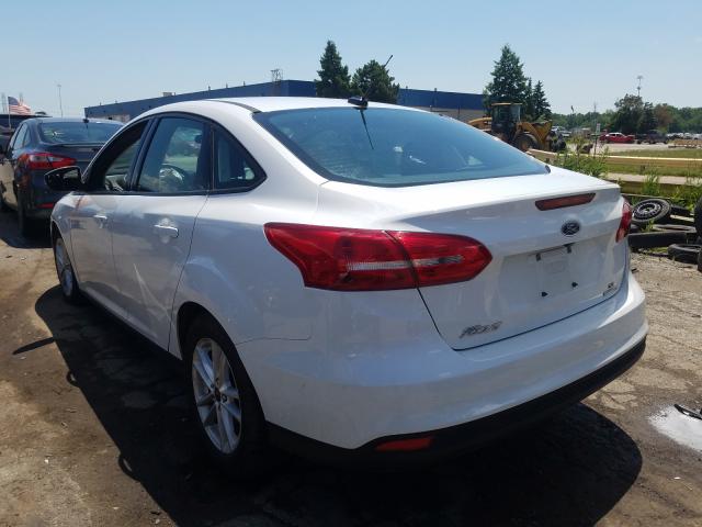 Photo 2 VIN: 1FADP3F25GL305502 - FORD FOCUS 