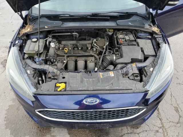 Photo 10 VIN: 1FADP3F25GL306018 - FORD FOCUS 