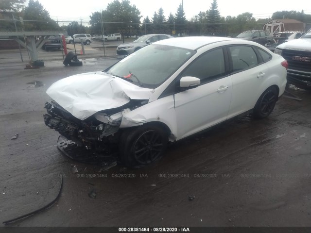 Photo 1 VIN: 1FADP3F25GL312997 - FORD FOCUS 