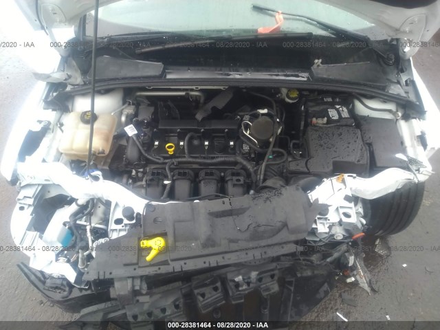 Photo 9 VIN: 1FADP3F25GL312997 - FORD FOCUS 