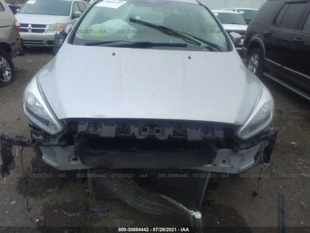 Photo 5 VIN: 1FADP3F25GL313955 - FORD FOCUS 