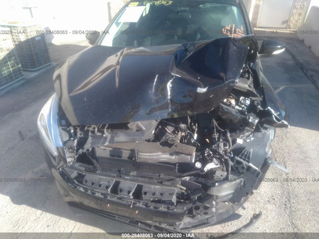 Photo 5 VIN: 1FADP3F25GL315365 - FORD FOCUS 