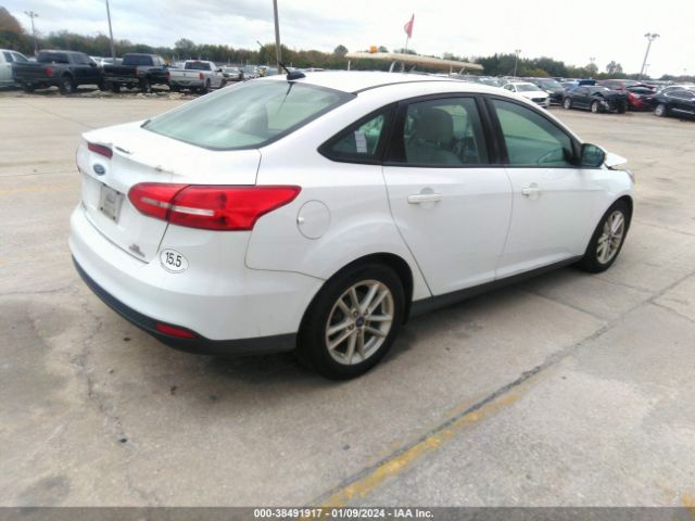 Photo 3 VIN: 1FADP3F25GL338340 - FORD FOCUS 