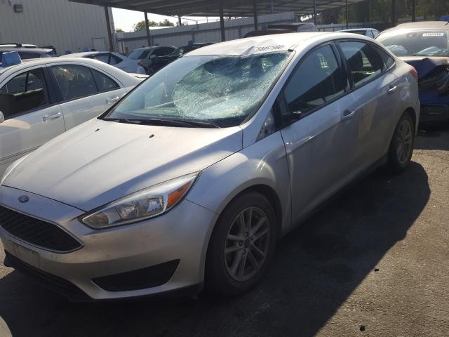 Photo 1 VIN: 1FADP3F25GL347829 - FORD FOCUS SE 