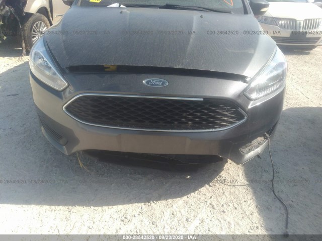 Photo 5 VIN: 1FADP3F25GL355686 - FORD FOCUS 