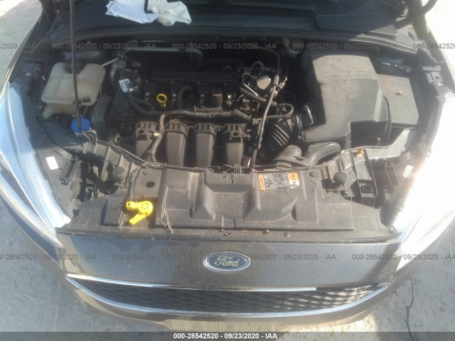 Photo 9 VIN: 1FADP3F25GL355686 - FORD FOCUS 