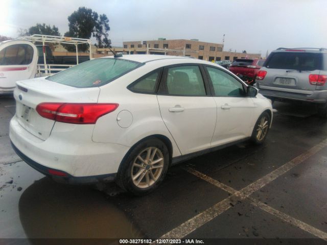 Photo 3 VIN: 1FADP3F25GL363285 - FORD FOCUS 