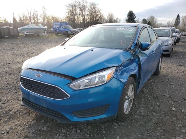 Photo 1 VIN: 1FADP3F25GL363562 - FORD FOCUS SE 