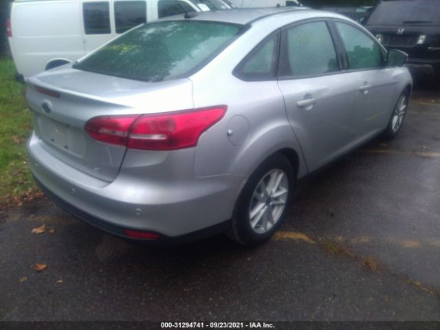 Photo 3 VIN: 1FADP3F25GL375646 - FORD FOCUS 