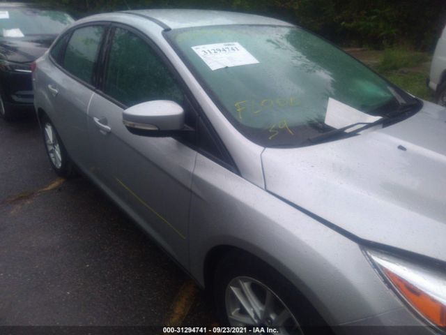 Photo 5 VIN: 1FADP3F25GL375646 - FORD FOCUS 