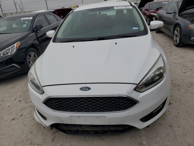 Photo 4 VIN: 1FADP3F25GL394987 - FORD FOCUS SE 