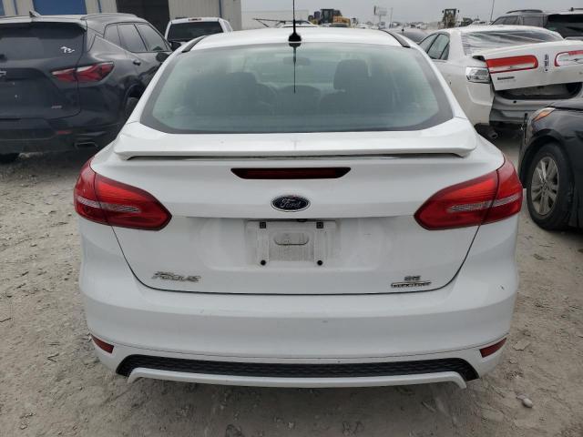 Photo 5 VIN: 1FADP3F25GL394987 - FORD FOCUS SE 