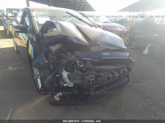 Photo 5 VIN: 1FADP3F25GL395833 - FORD FOCUS 