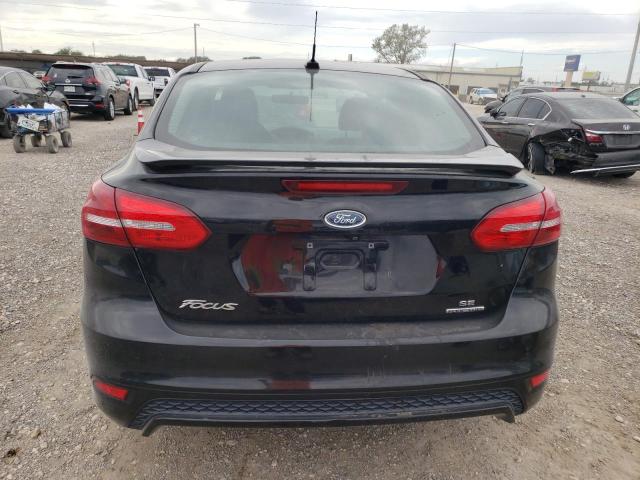 Photo 5 VIN: 1FADP3F25GL397341 - FORD FOCUS SE 