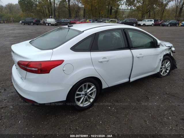 Photo 3 VIN: 1FADP3F25GL399641 - FORD FOCUS 