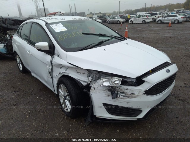 Photo 5 VIN: 1FADP3F25GL399641 - FORD FOCUS 