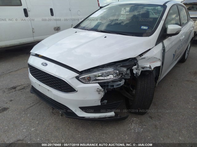 Photo 5 VIN: 1FADP3F25HL229863 - FORD FOCUS 