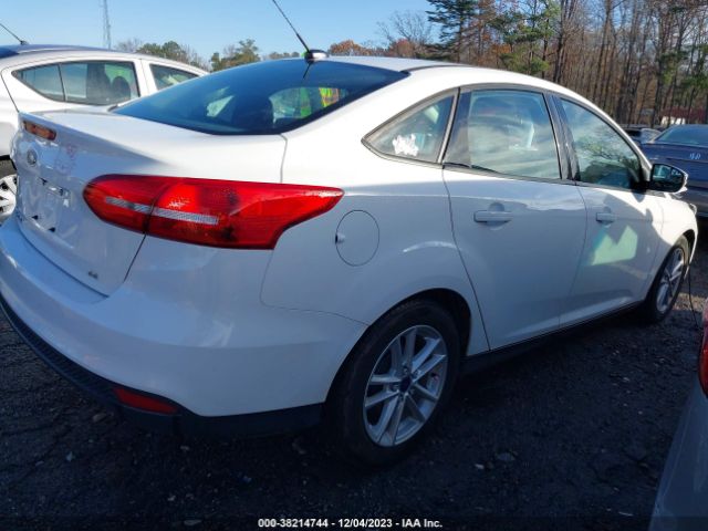 Photo 3 VIN: 1FADP3F25HL288573 - FORD FOCUS 