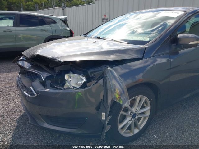 Photo 5 VIN: 1FADP3F25HL295345 - FORD FOCUS 