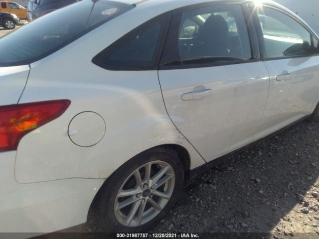 Photo 5 VIN: 1FADP3F25HL321605 - FORD FOCUS 