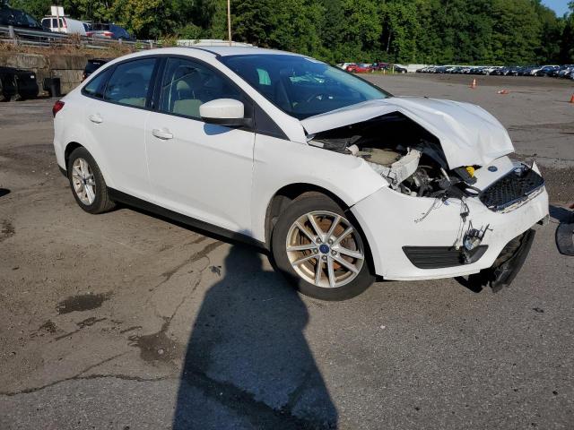 Photo 3 VIN: 1FADP3F25JL206511 - FORD FOCUS SE 