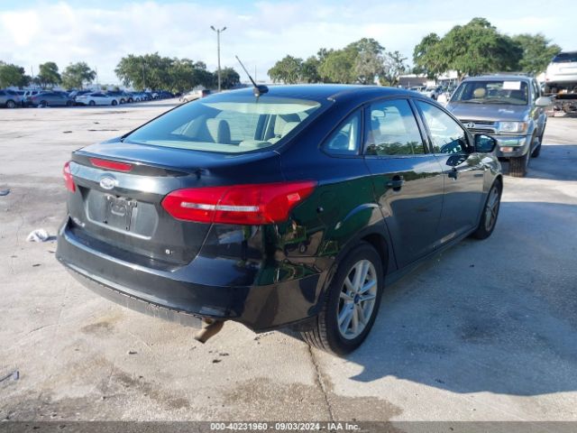 Photo 3 VIN: 1FADP3F25JL206542 - FORD FOCUS 