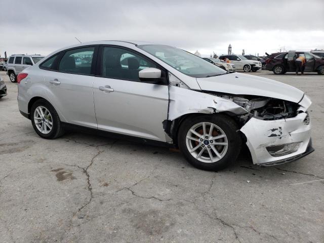 Photo 3 VIN: 1FADP3F25JL222210 - FORD FOCUS SE 