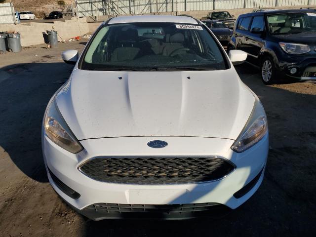 Photo 4 VIN: 1FADP3F25JL230243 - FORD FOCUS SE 